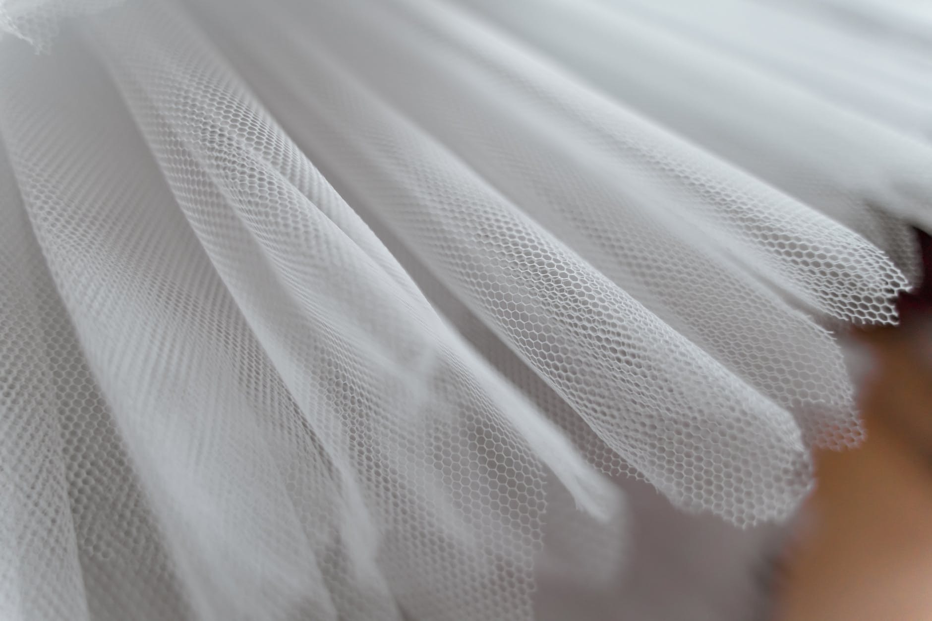 white tule fabric in close up photography